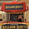 Street Fair Booth, Balloon Darts, Carnival Booth, Throwing darts at balloons